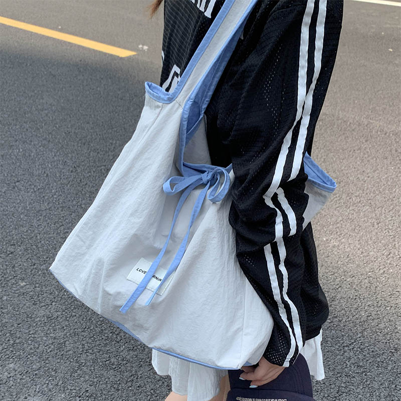 文艺休闲大容量托特包2025新款日常通勤正反可背韩版气质女单肩包