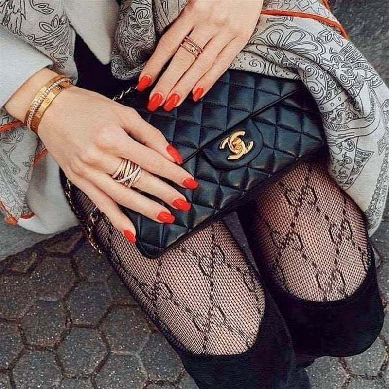 European and American foreign trade fun letters sexy black fishing net silk stockings women's pantyhose thin ins tide brand net red