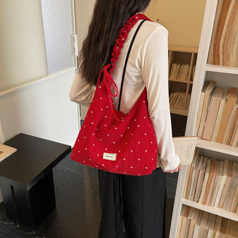 韩系碎花波点红色帆布包女2026春夏新款大容量通勤百搭单肩斜挎包