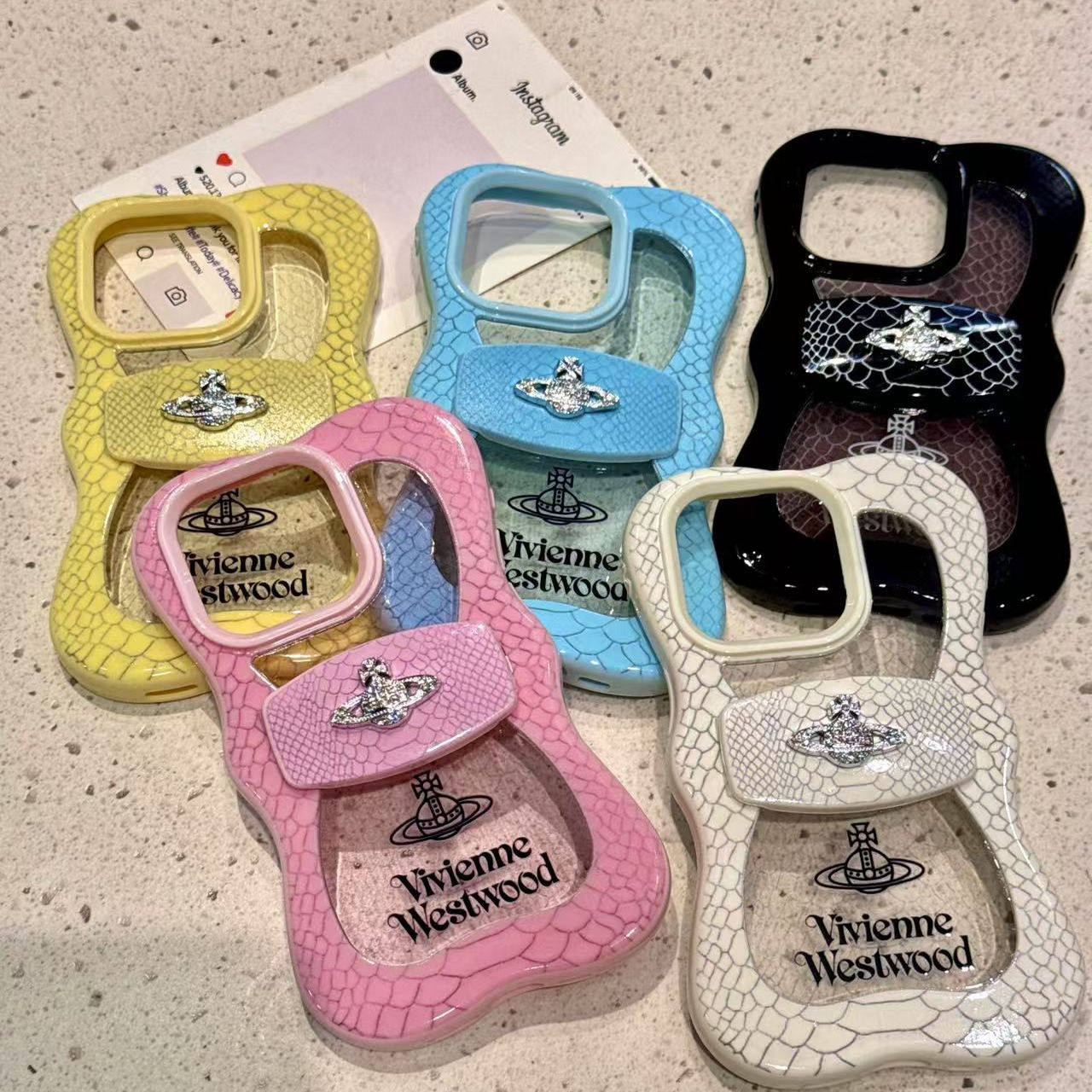 创意蝴蝶结支架鱼鳞纹环绕星球适用于iphone16promax手机壳苹果15高级感小众ins风新款防摔