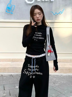 国潮牌黑色字母长袖t恤女秋季修身显瘦设计感百搭气质款上衣潮