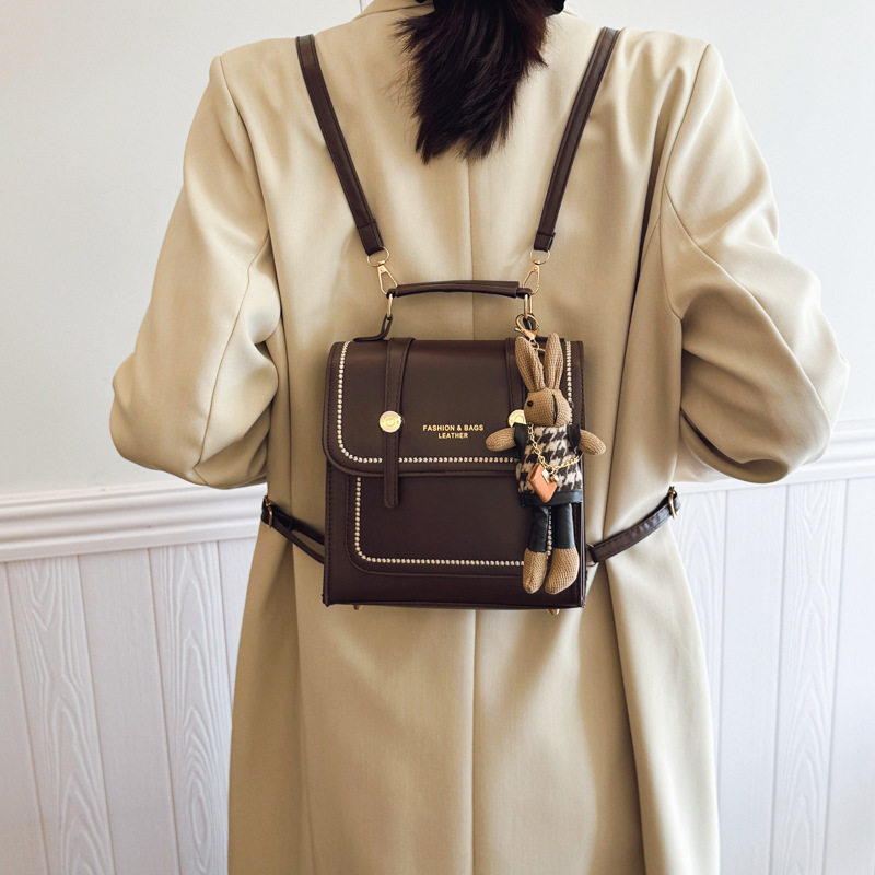 2025挂件新款休闲大容量双肩手提包复古学院风纯色潮流女士小背包