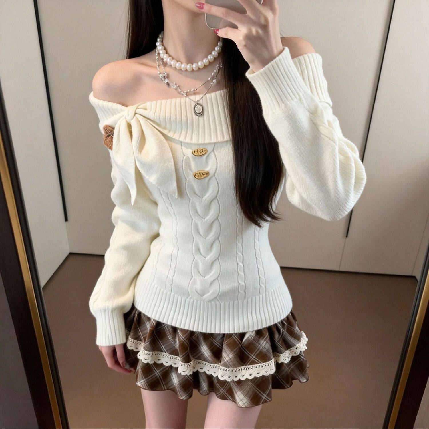 一字肩露肩针织毛衣女2026新款设计感超好看显瘦收腰甜美上衣春季