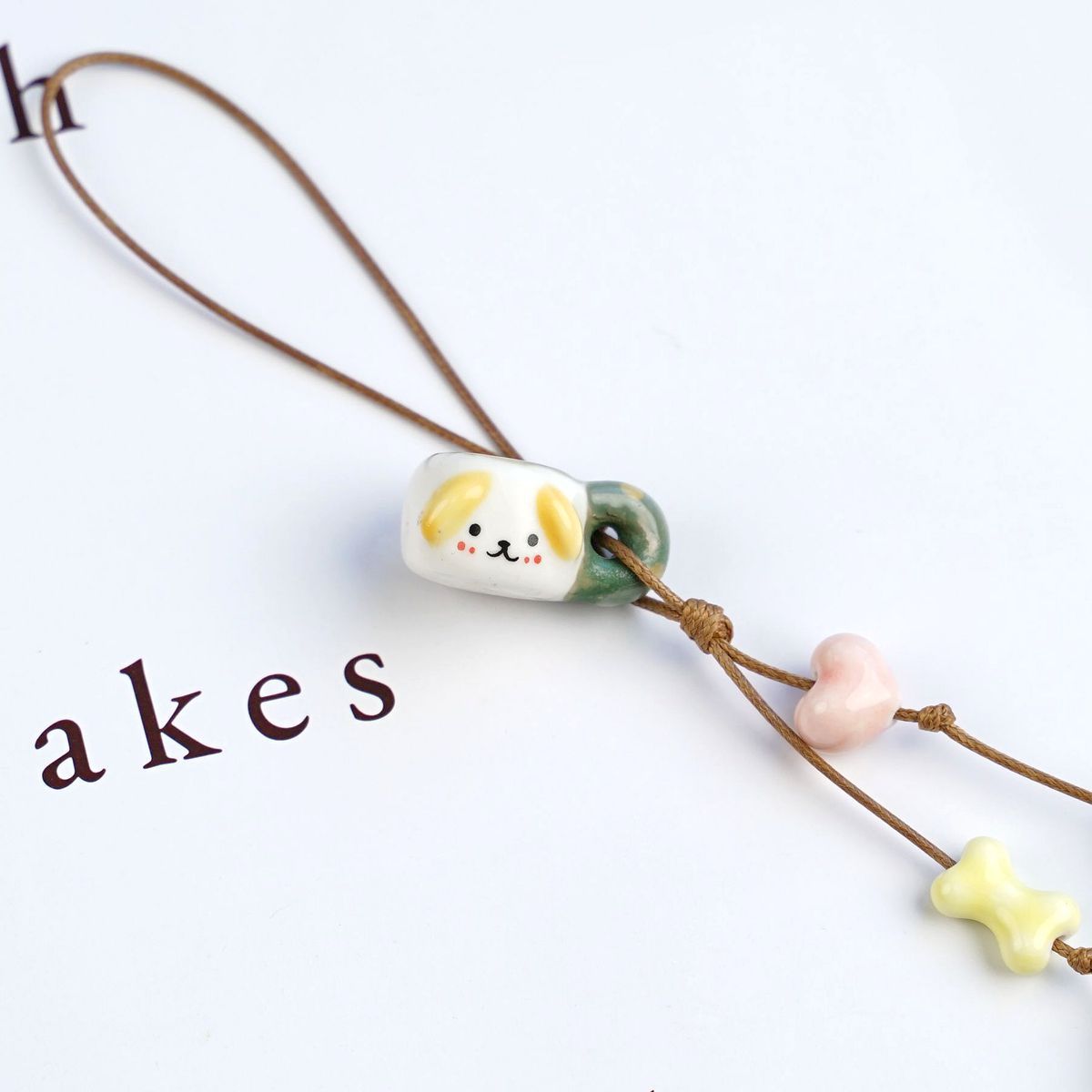 清新卡通狗开运吉祥编织手机小挂件饰品 如意生花包挂钥匙扣u盘防