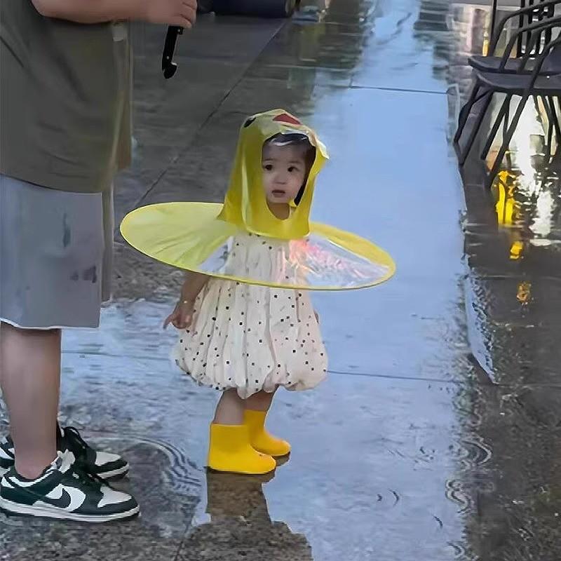 兒童飛碟雨衣小黃鴨斗篷式雨傘帽