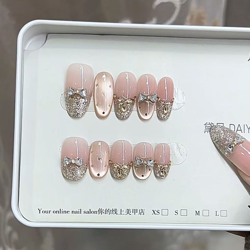 奈姿纯手工粉色蝴蝶结穿戴甲