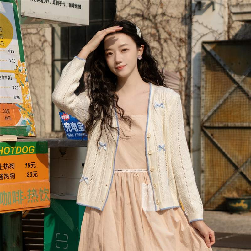 微笑向暖 温柔风甜美蓝色蝴蝶结镂空针织衫毛衣外套百搭针织开衫