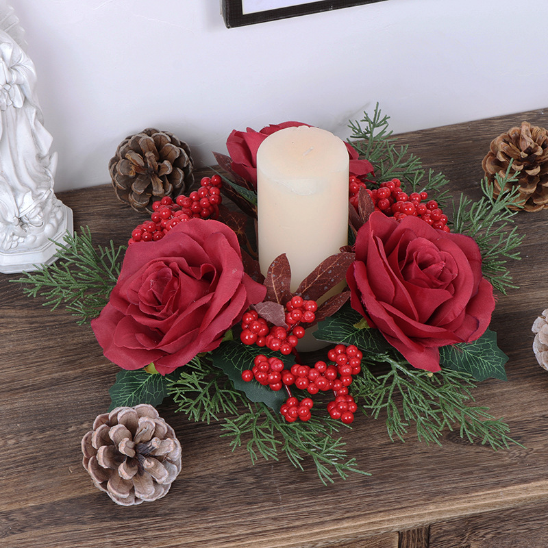 Christmas wreath decorated with red berries, candle holder,