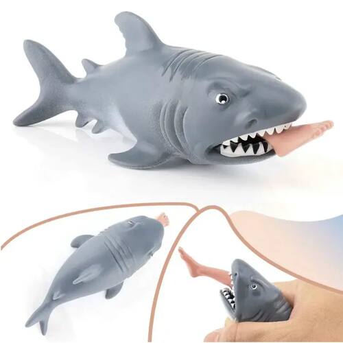 Interesting man eating shark squeezing leg eating toy terrif