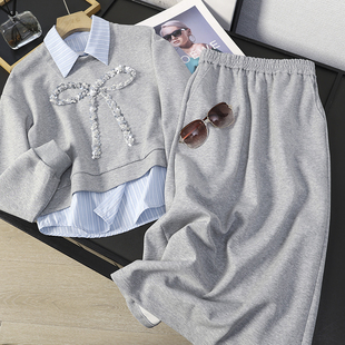 华子家 重工钉珠蝴蝶结假两件卫衣高腰开叉半身裙套装连衣裙46059