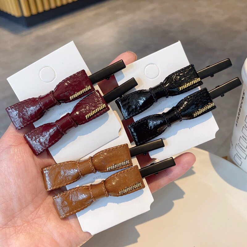 时尚皮质蝴蝶结高级感字母鸭嘴夹