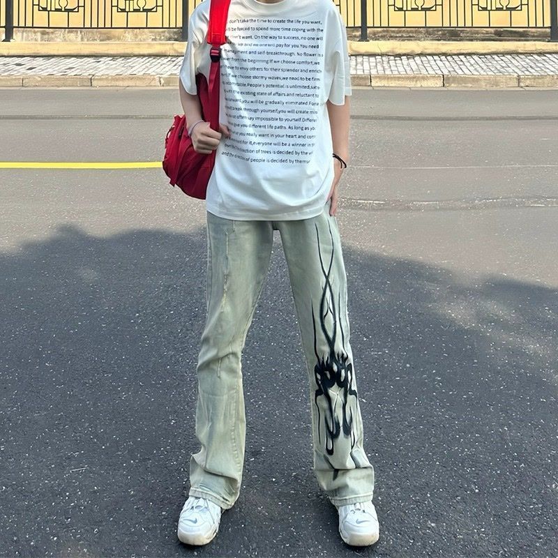 中大童美式复古秋季高街火焰残影印花牛仔裤男显瘦微喇叭长裤子男