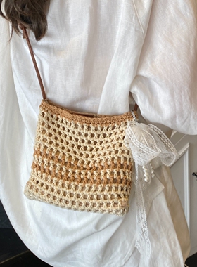 夏天超火镂空编织包女2026新款海边度假沙滩包百搭轻便斜挎手机包