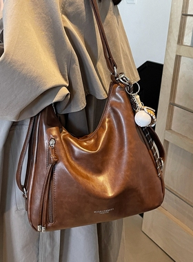 秋冬复古大容量双肩包女2025新款通勤旅行包多功能单肩斜挎托特包