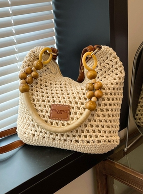 海边度假沙滩包女2026新款夏天大容量镂空编织包单肩斜挎托特包潮