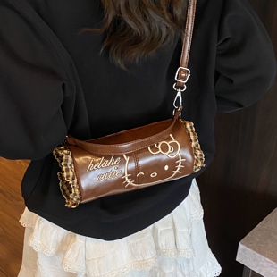 美拉德复古迷你小包包女式2026新款可爱卡通斜挎包手提圆筒枕头包