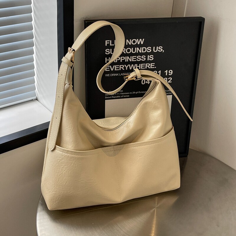 简约大容量包包女秋冬新款休闲软皮单肩包学生上课通勤斜挎托特包