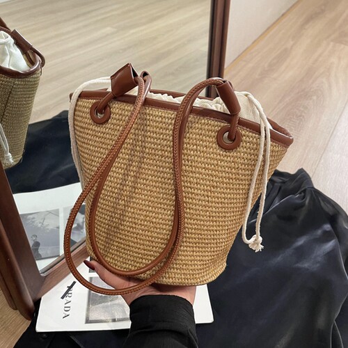 夏天手工编织百搭单肩草编水桶包