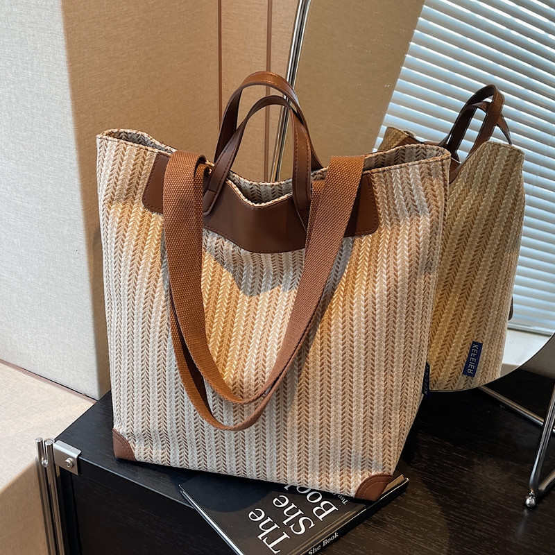 文艺小众帆布包女2025新款大容量通勤单肩包休闲手提购物袋旅行包