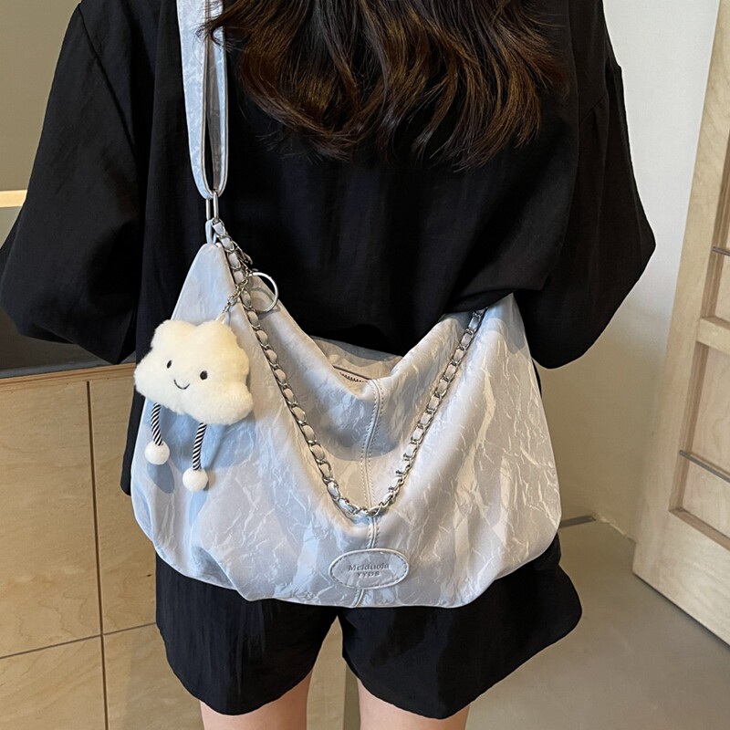 休闲大容量包包女2026新款秋冬时尚流行单肩包学生通勤斜挎饺子包