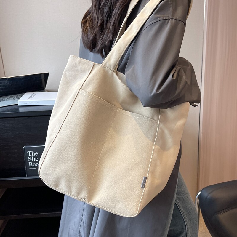 大容量托特包女2025新款秋冬简约休闲单肩帆布包大学生上课通勤包