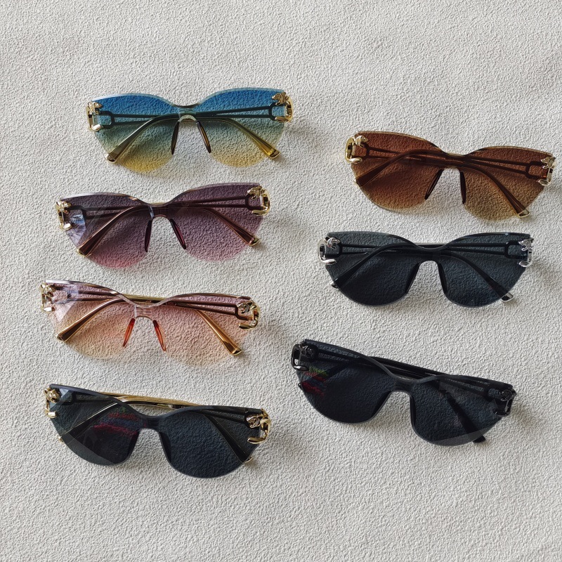 2025新款跨境无框猫眼墨镜欧美个性豹子头连体渐变时尚潮流太阳镜