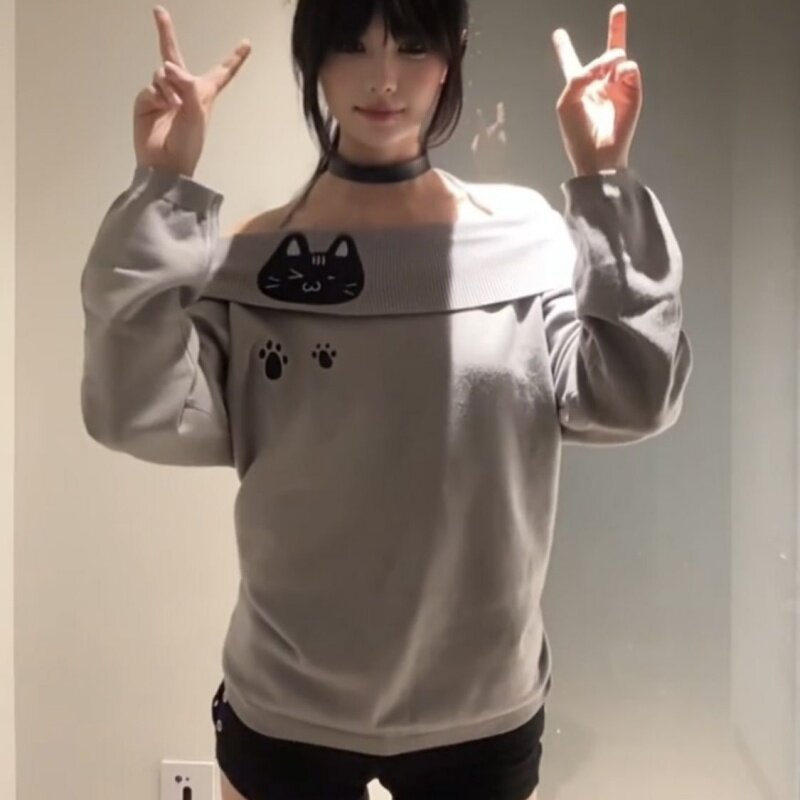刺绣猫咪长袖t恤女春秋2026新款外穿辣妹爆款露肩显瘦一字肩上衣