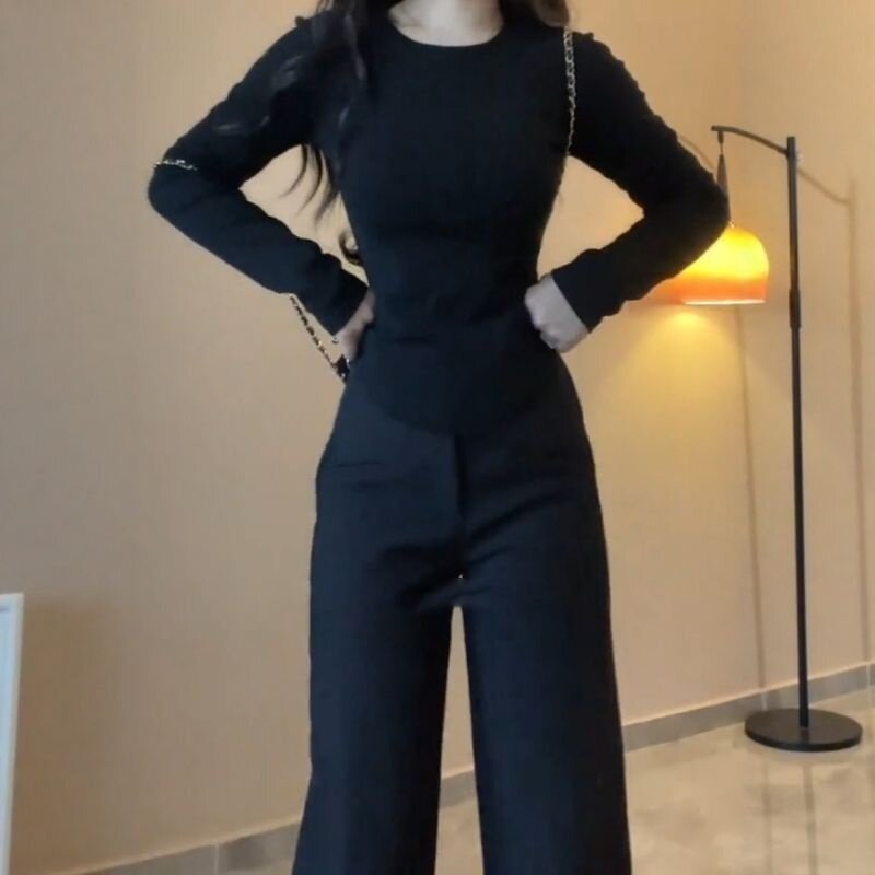 2026年秋冬季新款修身显瘦百搭上衣纯欲圆领不规则下摆长袖T恤女