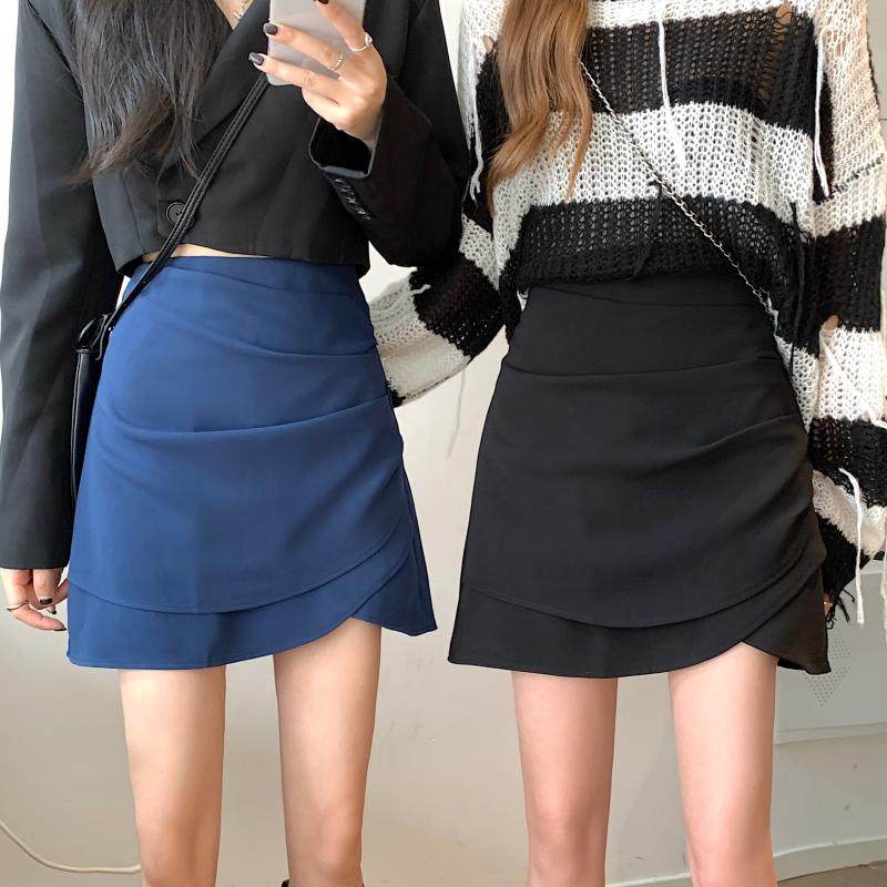 白色不规则褶皱半身裙大码设计感a字裙开叉包臀裙夏高腰遮肚短裙