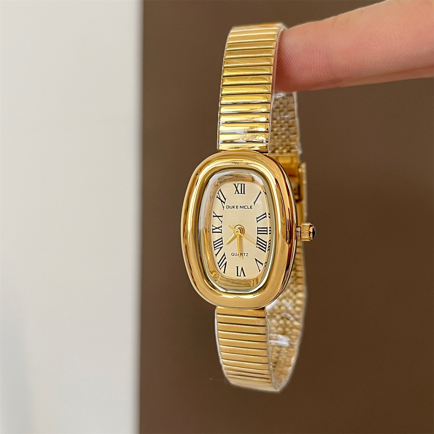 DUKE NICLE小众冷淡风椭圆形手表女款轻奢金色复古简约女士手腕表