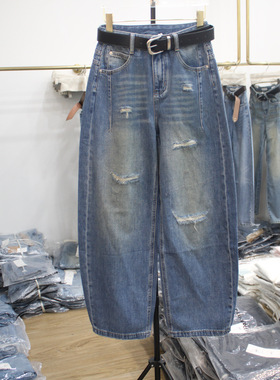 艾拿55129高腰破洞贴布牛仔弯刀裤2026年春季新款女装显瘦阔腿裤