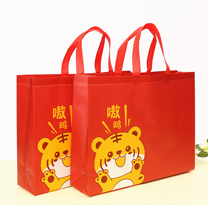 虎年无纺布袋子定做手提礼品印字logo环保覆膜购物定制衣服店袋子