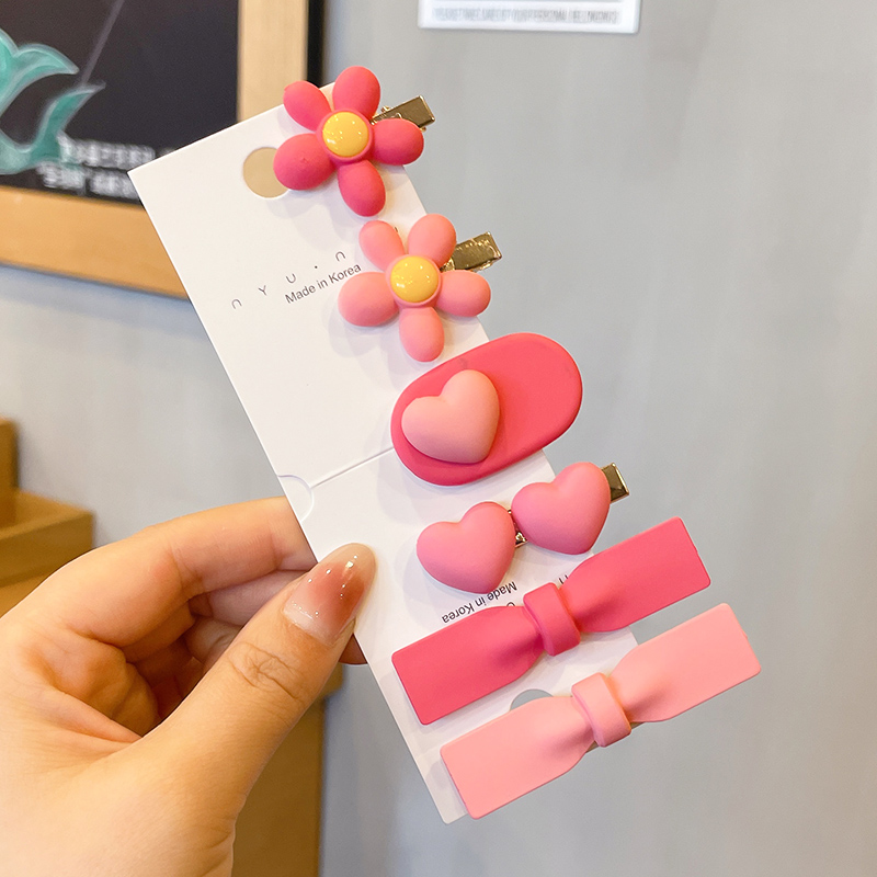 粉色发夹头饰爱心鸭嘴蝴蝶结侧边