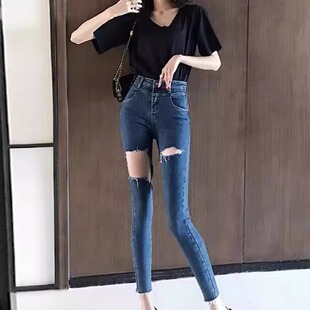 网红牛仔裤女夏季新款高腰破洞斜扣设计感紧身显瘦弹力九分小脚裤