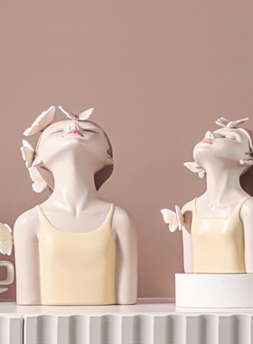 治愈系蝴蝶捧花女孩雕塑艺术清新摆件高级客厅电视柜桌面家居饰品