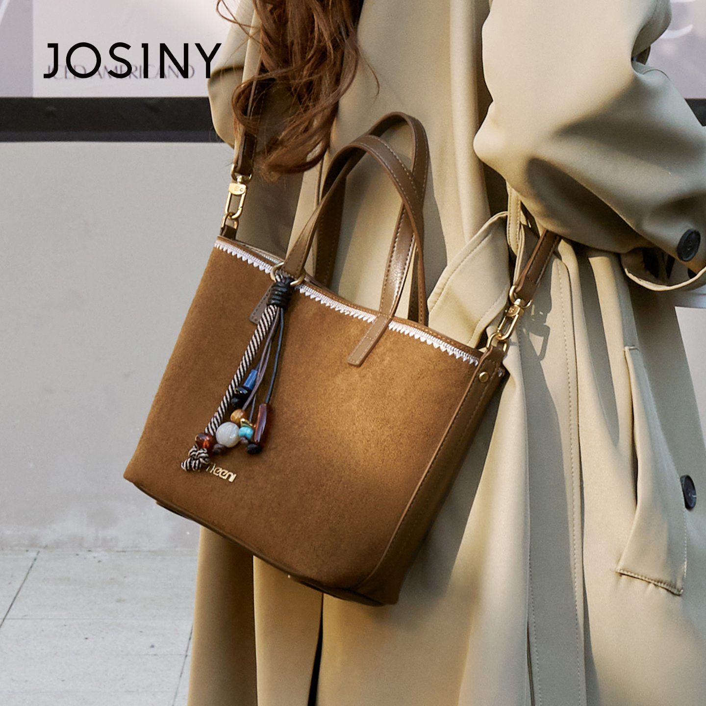 卓诗尼2025新款时尚手提包