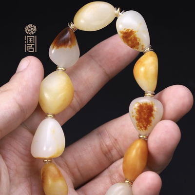 【姑苏润石堂】在售41.1克新疆和田玉籽料原石手串