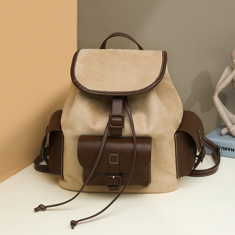 小众复古英伦风双肩包女2025新款抽绳翻盖日常旅行书包大容量背包