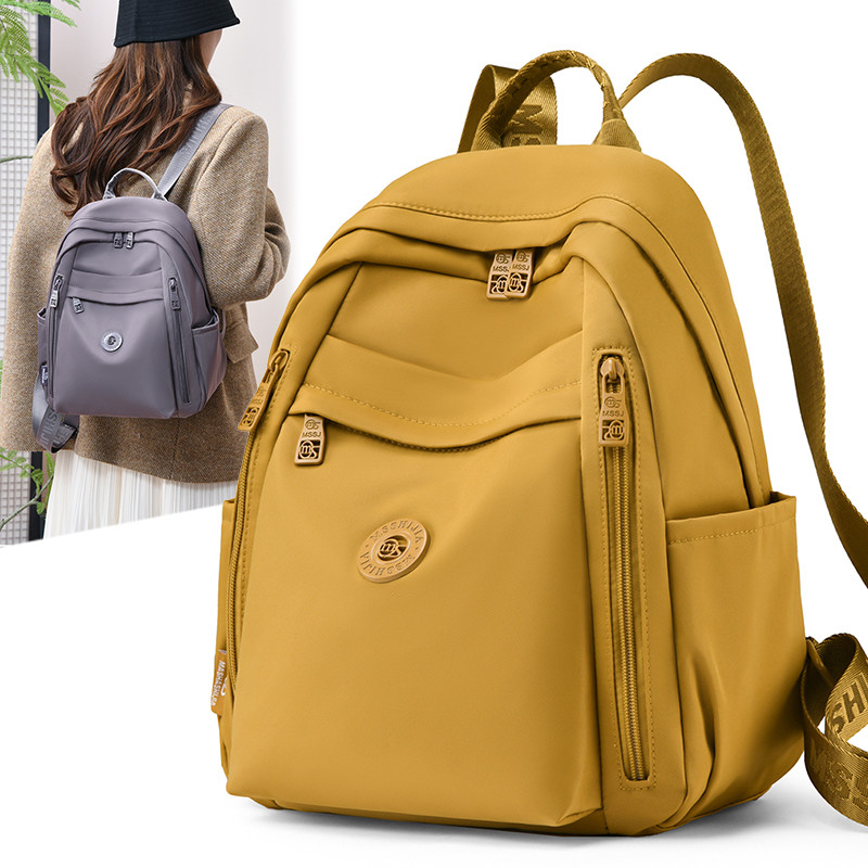时尚休闲双肩包女2026新款通勤旅行背包轻便简约大容量学生书包