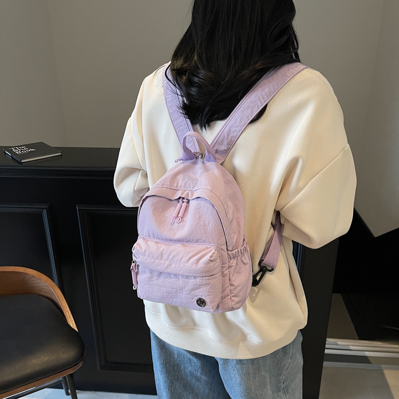 简约韩版双肩包女2025新款尼龙布斜挎胸包外出超轻便旅行日常背包