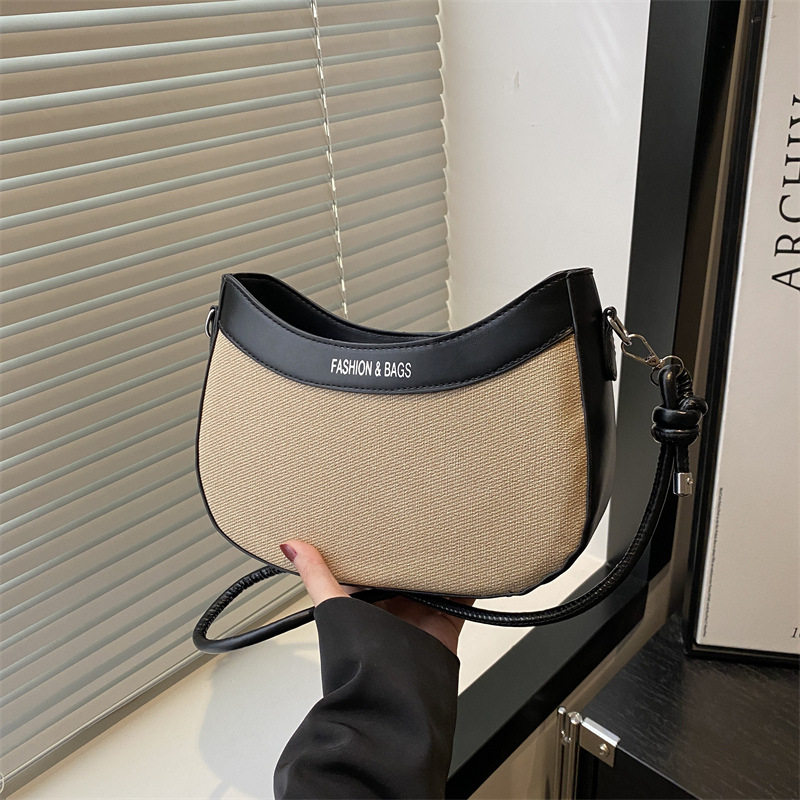斜挎单肩简约撞色饺子包