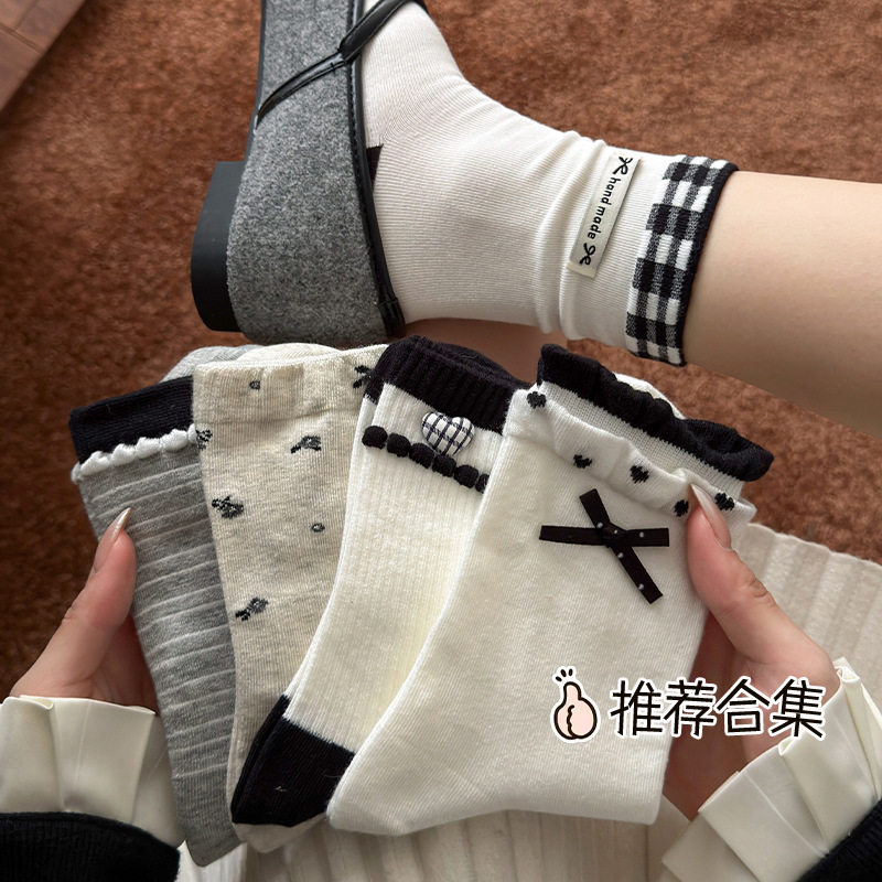 秋季袜子女中筒袜黑白蝴蝶结布标吸汗堆堆袜韩系ins百搭无骨女袜