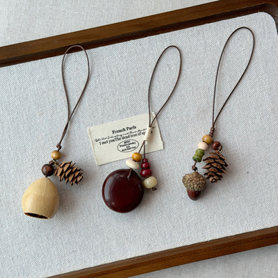 云南大理天然植物果实挂件创意伴手礼印尼黑果夹竹桃小挂饰手机链