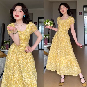 法式气质黄色碎花连衣裙子女夏季2025新款海边度假高级感收腰长裙