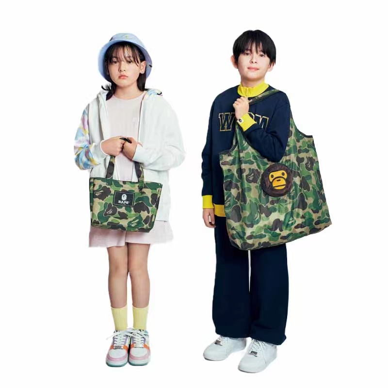 包邮新款日本杂志潮牌迷彩手提包猴头挂件单肩购物袋小圆包两件套