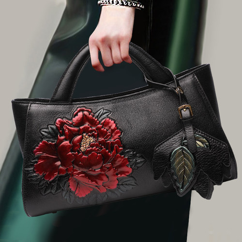 民族风牛皮压花大容量手提包女包