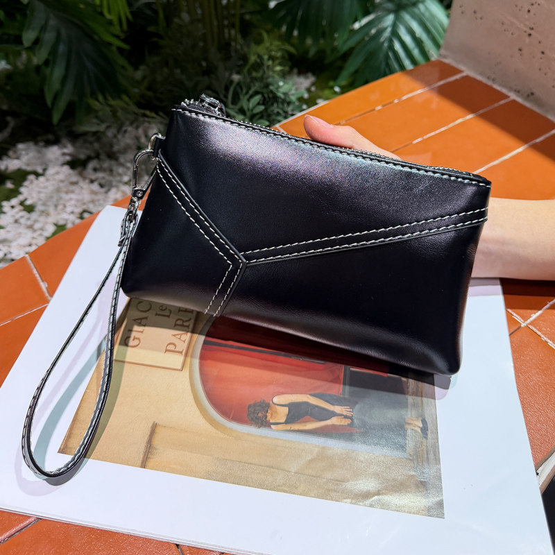 丝芙伦植鞣头层牛皮小手包手拎包