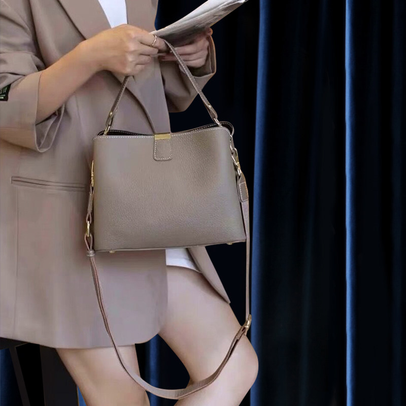 头层牛皮斜挎手提包菜篮子包2025秋冬新款真皮大容量水桶包休闲包,箱包皮具/热销女包/男包,水桶包,淘宝优惠券,粉丝福利购,淘宝优惠卷