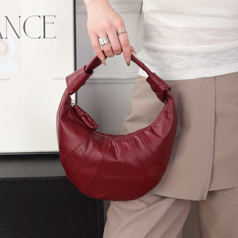 丝芙伦进口牛皮腋下单肩包牛角包