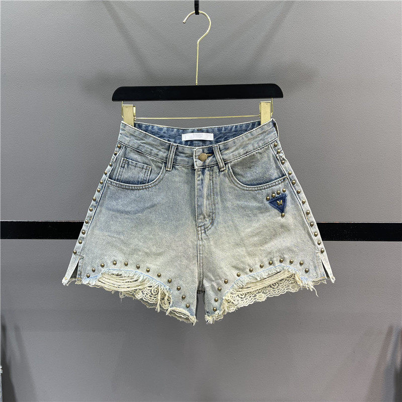 复古铆钉蕾丝拼接牛仔短裤女2026夏季高腰显瘦A字开叉阔腿热裤潮